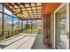 Enclosed patio with ceiling fan and brick support structure at 108 Colonial Dr, Kings Mountain, NC 28086