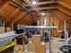 View of a spacious attic with wooden beams, offering ample storage and potential for customization at 1158 South S St, Cornelius, NC 28031