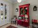 Welcoming entryway showcasing a vibrant red cabinet and views to the front of the house at 1158 South S St, Cornelius, NC 28031