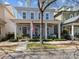 Charming two-story home with a welcoming front porch, swing, and an American flag displayed at 1158 South S St, Cornelius, NC 28031