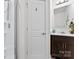 Well lit bathroom featuring a shower with glass door and a sink with a dark wood cabinet at 1195 Cavalier Ln, Rock Hill, SC 29730