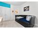 Bedroom with daybed, carpeted floor, and double doors leading to the hallway at 1195 Cavalier Ln, Rock Hill, SC 29730