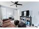 Cozy bedroom with ceiling fan, couch and entertainment center at 1195 Cavalier Ln, Rock Hill, SC 29730