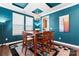 Dining room with seating for six, modern light fixture, and sight lines to the kitchen at 1195 Cavalier Ln, Rock Hill, SC 29730