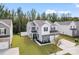 Beautiful two-story home boasts a manicured lawn, stone accents, and a convenient two-car garage for modern living at 1195 Cavalier Ln, Rock Hill, SC 29730