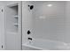 Renovated bathroom featuring white subway tile and modern fixtures at 1356 Ford Dr, Lowell, NC 28098