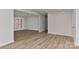 Beautiful living room featuring French doors and modern laminate flooring at 1356 Ford Dr, Lowell, NC 28098