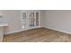 Bright room with French doors and modern laminate flooring at 1356 Ford Dr, Lowell, NC 28098