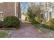 Long driveway leading to a detached garage, providing ample parking and enhancing the property's convenience at 1626 Beverly Dr, Charlotte, NC 28207