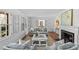 Bright living room featuring a fireplace, neutral-toned furniture, and plenty of natural light at 1626 Beverly Dr, Charlotte, NC 28207