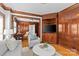 Inviting living room featuring hardwood floors, wood trim and natural light at 1626 Beverly Dr, Charlotte, NC 28207