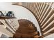 Elegant staircase with dark wood steps and white railings at 2007 Fernhurst Ter, Matthews, NC 28104