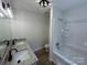 Bathroom features dual vanities, and a tub shower combination with modern fixtures at 2190 Pacer Rd, Lancaster, SC 29720