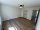 Bright, spacious bedroom with hardwood floors and ceiling fan and closet at 2190 Pacer Rd, Lancaster, SC 29720