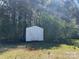 View of a small white storage shed in the backyard at 2190 Pacer Rd, Lancaster, SC 29720