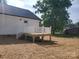 Exterior view showcasing a new wooden deck with white railings at 2200 Clay St # 2, Kannapolis, NC 28083