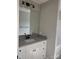 Bathroom vanity featuring granite countertops, a decorative faucet, and white drawers and cabinets at 2200 Clay St # 2, Kannapolis, NC 28083