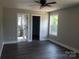 Bedroom showcasing hardwood floors, bathroom, closet, and lots of natural light at 2200 Clay St # 2, Kannapolis, NC 28083