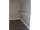 Walk-in closet provides ample storage with wire shelving and dark vinyl flooring at 2200 Clay St # 2, Kannapolis, NC 28083