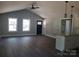 Cozy living room with vaulted ceiling, multiple windows, and an open floor plan at 2200 Clay St # 2, Kannapolis, NC 28083