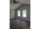 Bright living room features hardwood floors, a ceiling fan, and natural light at 2200 Clay St # 2, Kannapolis, NC 28083