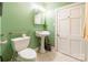 Bathroom with toilet and pedestal sink at 2455 Wellridge Rd, Chester, SC 29706