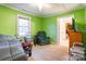 Comfortable bedroom with green walls, ceiling fan, and lots of natural light at 2455 Wellridge Rd, Chester, SC 29706