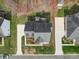 An aerial view showcases the roof, driveway, and landscaping of this property at 2538 Cherry Bark Oak Ct, Gastonia, NC 28056