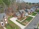 Beautiful brick home featuring a well-maintained yard and a welcoming front porch at 2538 Cherry Bark Oak Ct, Gastonia, NC 28056