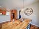 Open-concept dining area with hardwood floors, connecting seamlessly to the kitchen at 2538 Cherry Bark Oak Ct, Gastonia, NC 28056