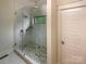 Stunning bathroom features a glass shower, rainfall showerhead, and modern fixtures at 2927 Clemson Ave, Charlotte, NC 28205