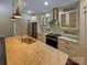 Gorgeous kitchen with a large island, stainless steel appliances, and custom cabinetry at 2927 Clemson Ave, Charlotte, NC 28205