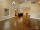 Open-concept living space with hardwood floors, kitchen, and natural light at 2927 Clemson Ave, Charlotte, NC 28205