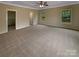 Spacious main bedroom with ceiling fan and ensuite access at 2927 Clemson Ave, Charlotte, NC 28205