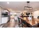 Open floorplan featuring a dining area and seamlessly connecting to a well-appointed kitchen and a cozy living space at 30 Hillsboro Rd, Taylorsville, NC 28681