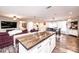 Bright living space, showcasing a view from the large kitchen island into the comfy living room with neutral walls at 30 Hillsboro Rd, Taylorsville, NC 28681