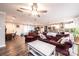 Spacious open-concept living area with hardwood floors, connected to the dining area and kitchen, providing an airy feel at 30 Hillsboro Rd, Taylorsville, NC 28681