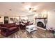 Open-concept living room and kitchen area with stainless appliances, creating an inviting space for gatherings and daily living at 30 Hillsboro Rd, Taylorsville, NC 28681