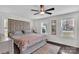 Comfortable main bedroom with hardwood floors, neutral walls, and bedside lighting at 3036 Marlowe Ave, Charlotte, NC 28208