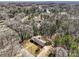 Aerial view of home surrounded by trees at 407 Pinecroft Ln, Spencer, NC 28159