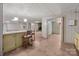 Spacious basement area with bar-style seating and view into a separate room at 407 Pinecroft Ln, Spencer, NC 28159