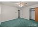 Bedroom featuring closet space, and ceiling fan at 407 Pinecroft Ln, Spencer, NC 28159