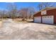 Detached two car garage with concrete driveway at 407 Pinecroft Ln, Spencer, NC 28159