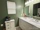 Bathroom features double sinks, a vanity, and a neutral, modern design at 409 Fourth St, York, SC 29745