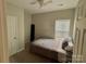 Bedroom featuring a twin bed and closet in a carpeted space at 409 Fourth St, York, SC 29745
