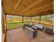 Spacious covered deck with outdoor furniture and a view of the backyard at 409 Fourth St, York, SC 29745