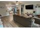 Cozy living room with hardwood floors, open floor plan to the kitchen, and natural light at 409 Fourth St, York, SC 29745