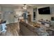 Inviting living room with wood floors, open floor plan with the kitchen, and comfortable seating at 409 Fourth St, York, SC 29745