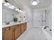 This bathroom features a double vanity and separate tub and shower at 44421 Oriole Dr # 203, Indian Land, SC 29707
