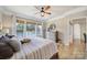 Bright bedroom features lake views from a large window and natural light at 44421 Oriole Dr # 203, Indian Land, SC 29707